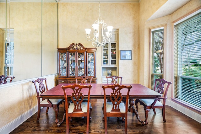 dining room with a chandelier and dark wood-type flooring