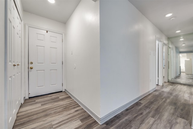 hall featuring wood-type flooring