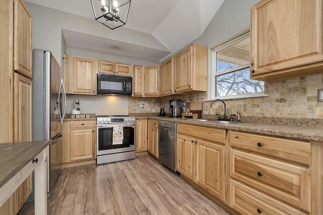 kitchen with sink, light hardwood / wood-style flooring, appliances with stainless steel finishes, light brown cabinetry, and decorative backsplash