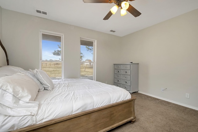 bedroom featuring ceiling fan and carpet flooring