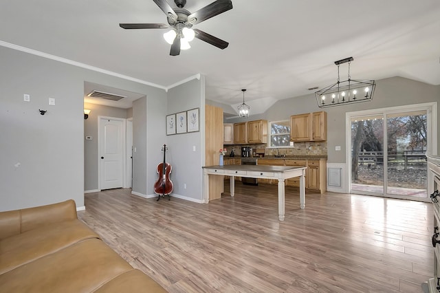 living room with crown molding, lofted ceiling, ceiling fan, and light hardwood / wood-style flooring