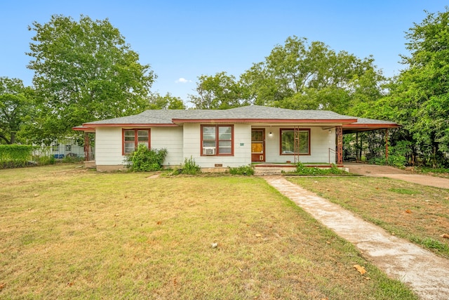 view of front of property with a carport, a porch, and a front yard