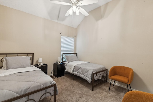 carpeted bedroom with ceiling fan and vaulted ceiling