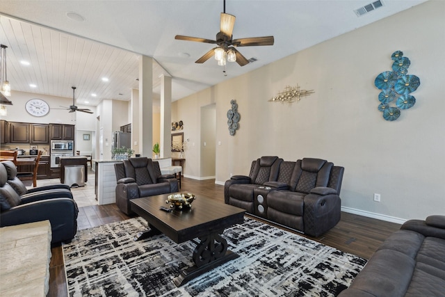 living room with ceiling fan and light wood-type flooring