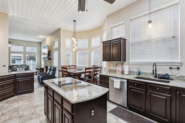 kitchen with sink, decorative light fixtures, dark brown cabinets, black electric cooktop, and dishwasher