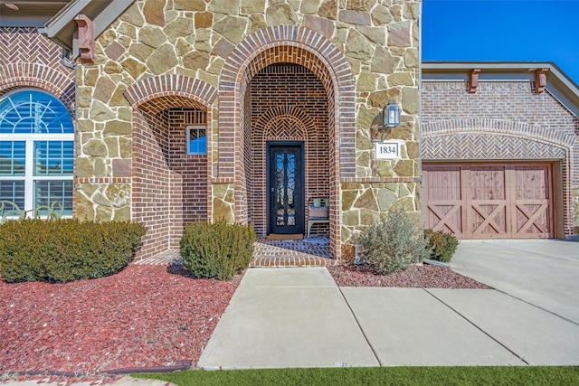 entrance to property featuring a garage