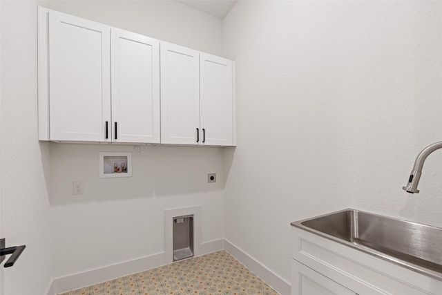 laundry area featuring cabinets, hookup for an electric dryer, hookup for a washing machine, and sink