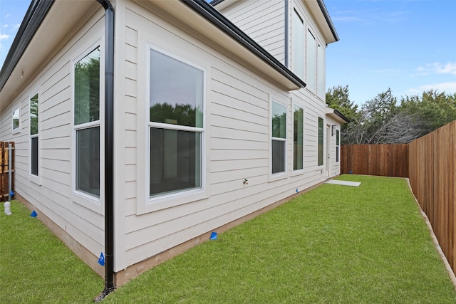 view of property exterior featuring a yard