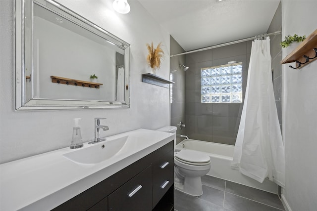 full bathroom featuring tile patterned flooring, vanity, toilet, and shower / bath combo