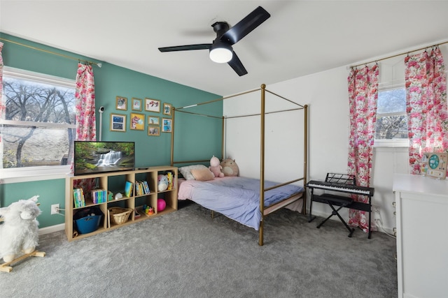 carpeted bedroom with ceiling fan