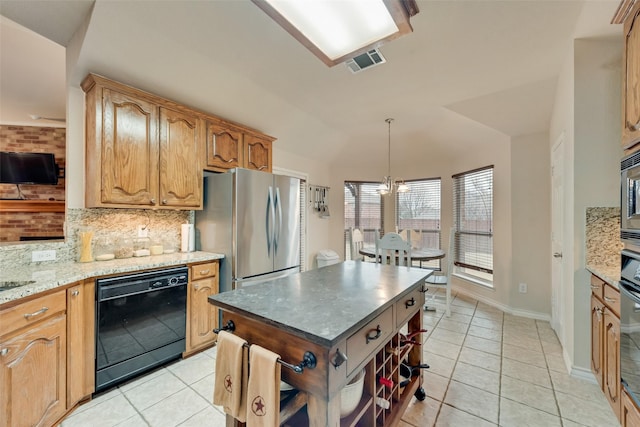 kitchen with light tile patterned floors, a kitchen island, pendant lighting, decorative backsplash, and black appliances