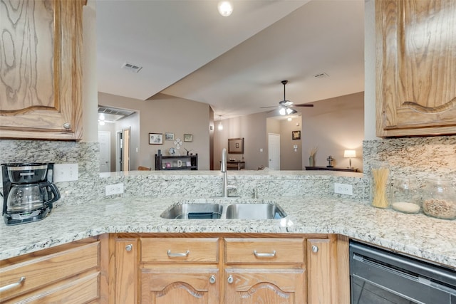 kitchen with sink, black dishwasher, kitchen peninsula, ceiling fan, and backsplash