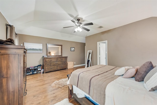 bedroom featuring ceiling fan and light hardwood / wood-style flooring