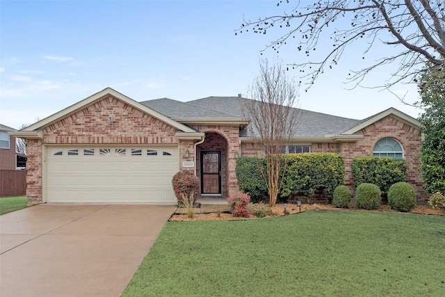 single story home with a garage and a front yard