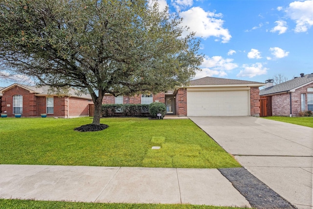 single story home featuring a garage and a front lawn