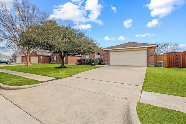 view of front of house featuring a garage and a front yard