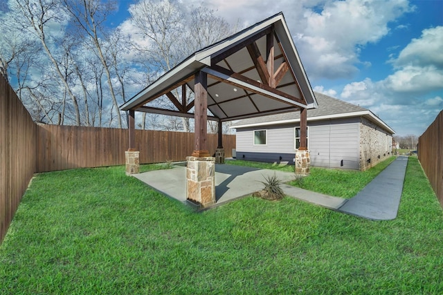 view of yard featuring a gazebo and a patio area