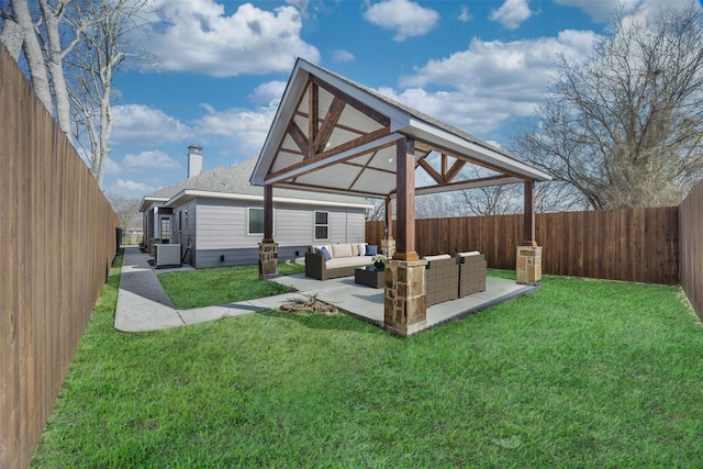 rear view of property with a patio, a lawn, cooling unit, an outdoor living space, and a gazebo