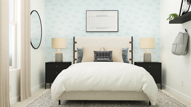 bedroom featuring multiple windows and carpet floors