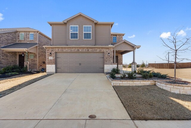 305 Grenada Lake Dr, Princeton, TX 75407 - view of front of property with a garage