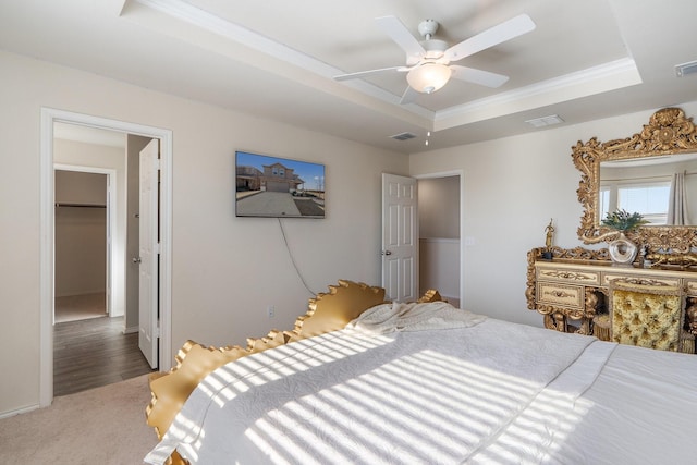 305 Grenada Lake Dr, Princeton, TX 75407 - bedroom featuring a raised ceiling, ornamental molding, carpet floors, and ceiling fan