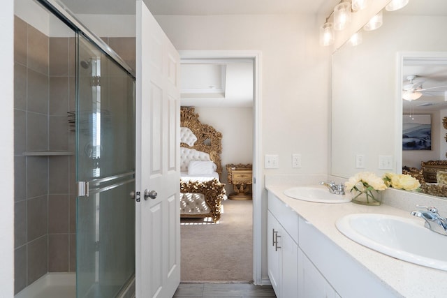 305 Grenada Lake Dr, Princeton, TX 75407 - bathroom with vanity, a shower with door, and ceiling fan