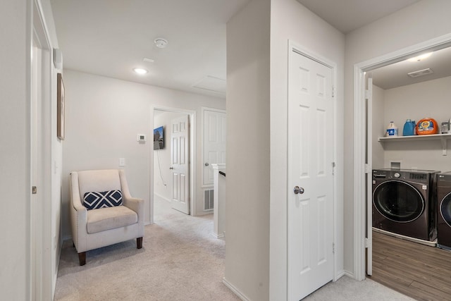 305 Grenada Lake Dr, Princeton, TX 75407 - laundry area featuring light carpet and washing machine and clothes dryer