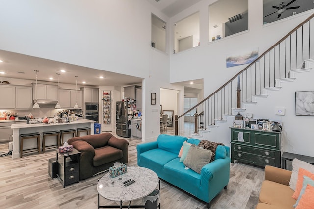 living room featuring light wood-type flooring