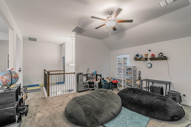 playroom with lofted ceiling, ceiling fan, and carpet flooring