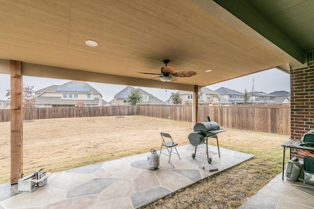 view of patio / terrace with a grill and ceiling fan