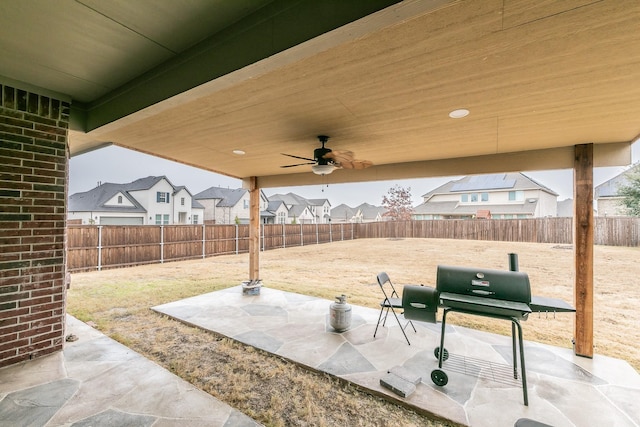 view of patio / terrace featuring grilling area and ceiling fan