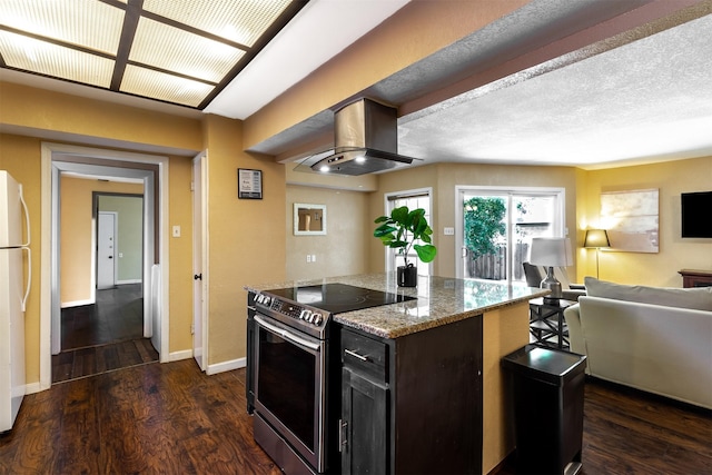 kitchen with stainless steel electric range, light stone counters, island exhaust hood, dark hardwood / wood-style flooring, and white fridge