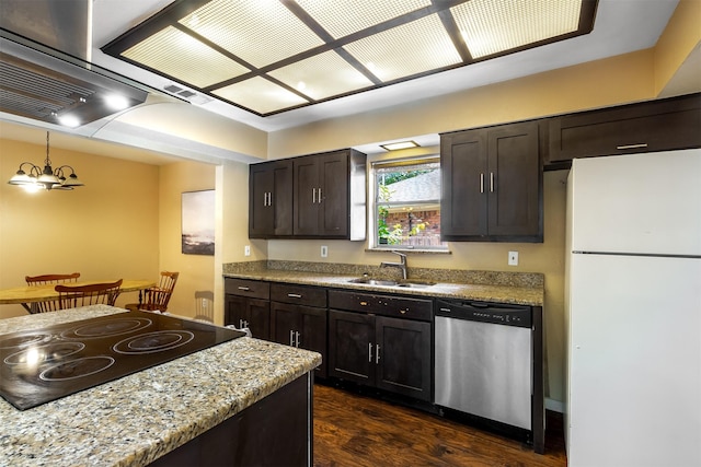 kitchen with sink, dishwasher, dark brown cabinets, white refrigerator, and black electric stovetop