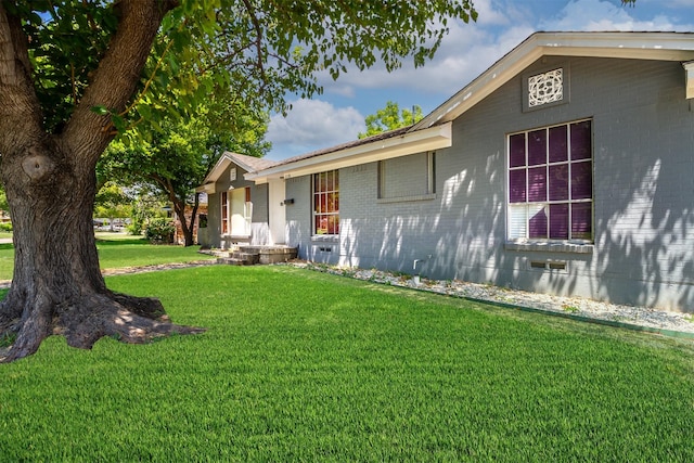 exterior space featuring a yard