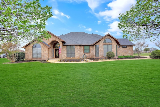 view of front of house with a front lawn