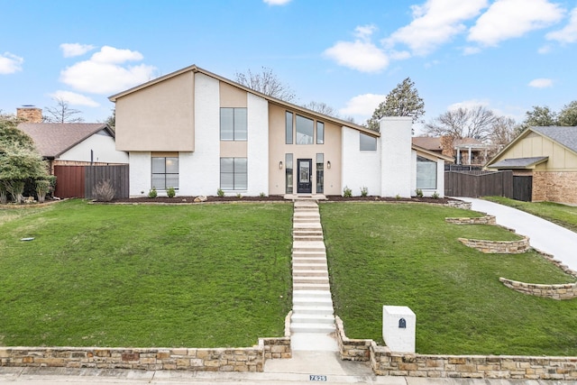 view of front of house with a front yard