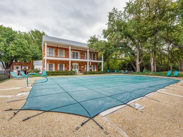 view of pool featuring a patio area