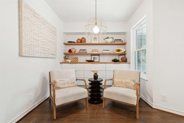 sitting room with dark hardwood / wood-style floors