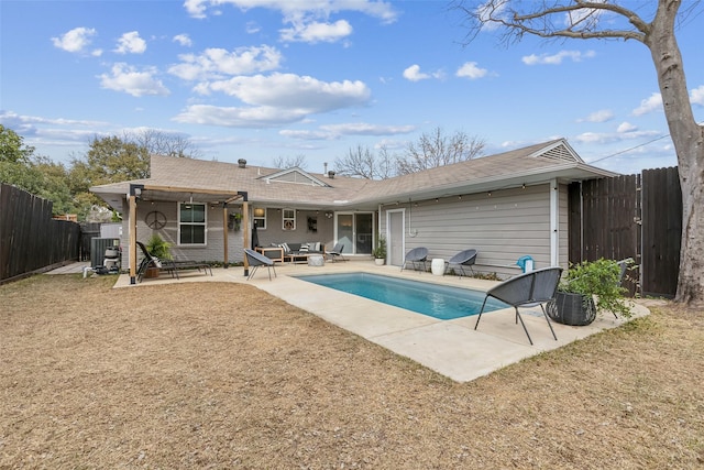 rear view of property featuring a fenced in pool, a patio area, outdoor lounge area, and central air condition unit