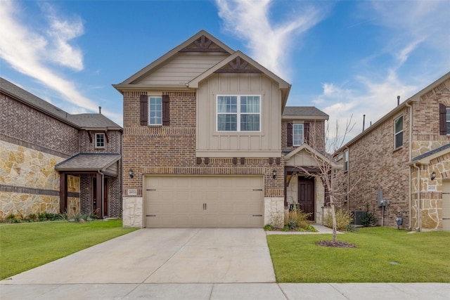 view of front of home featuring cooling unit, a garage, and a front lawn