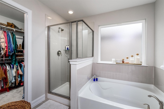 bathroom with plus walk in shower