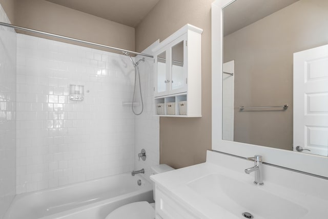 bathroom featuring shower / washtub combination, vanity, and toilet