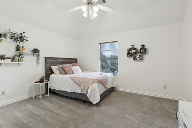 carpeted bedroom with lofted ceiling and ceiling fan