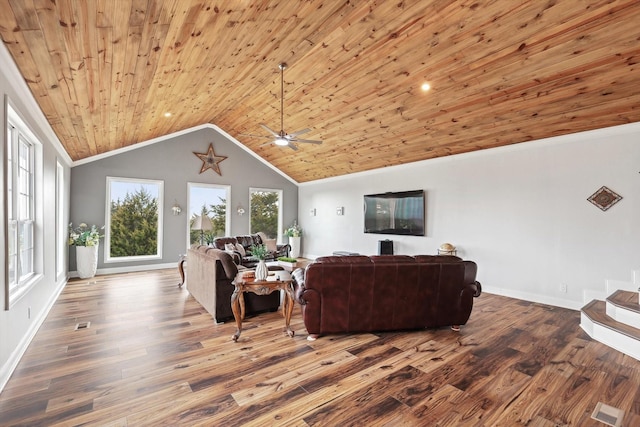 living room with crown molding, vaulted ceiling, hardwood / wood-style floors, and wooden ceiling