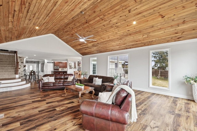 living room with ceiling fan, hardwood / wood-style floors, high vaulted ceiling, ornamental molding, and wooden ceiling