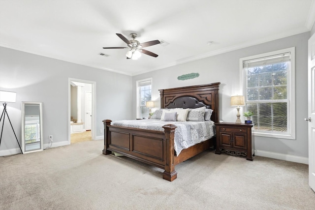 carpeted bedroom featuring ornamental molding and ceiling fan