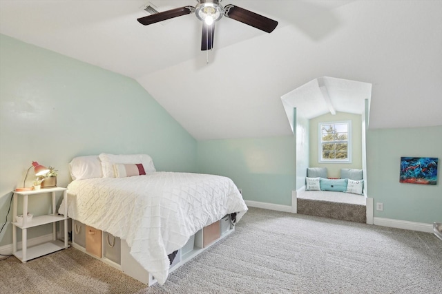 bedroom with lofted ceiling, light carpet, and ceiling fan