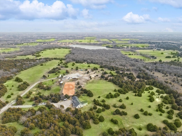 drone / aerial view featuring a water view and a rural view