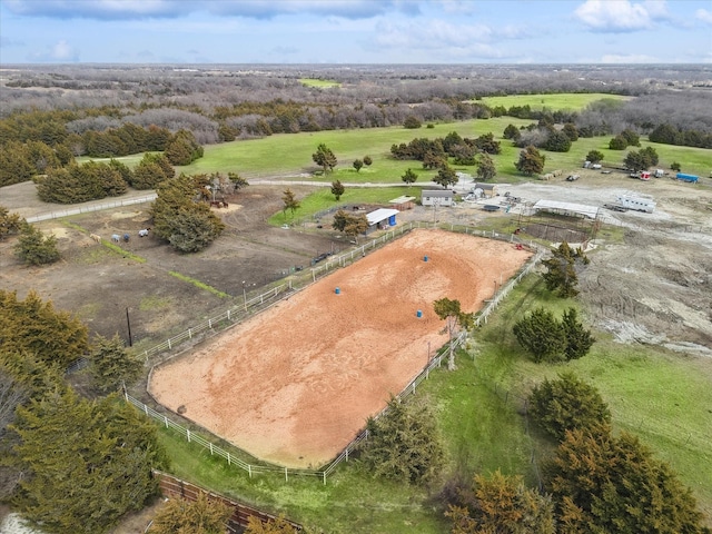 birds eye view of property featuring a rural view