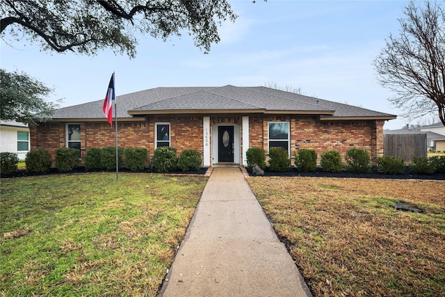 view of front facade with a front lawn